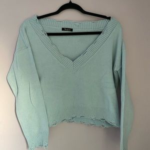 Blue knitted sweater v neck